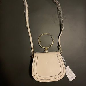 Cream crossbody with gold handle